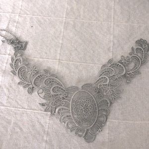 Lace designed fashion statement piece necklace.